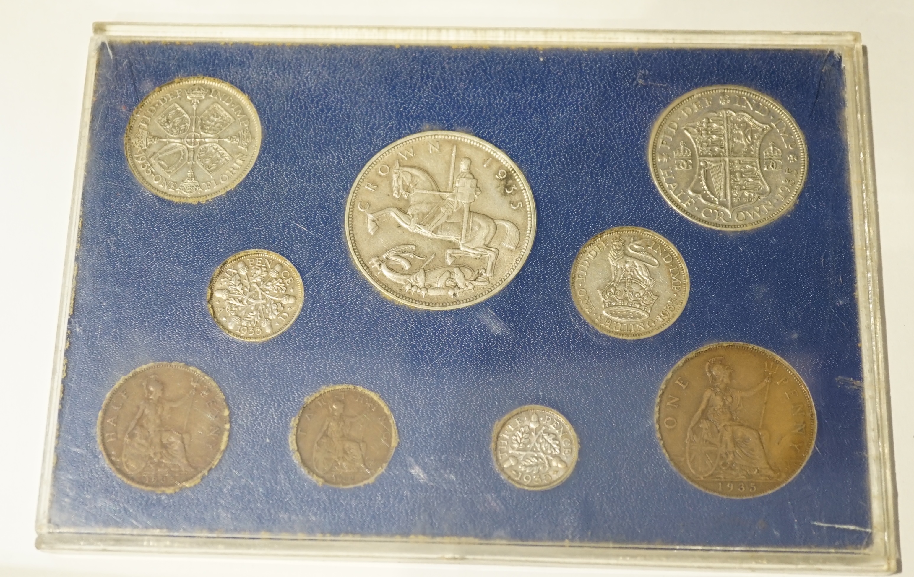 British coins, specimen sets; George V 1935 halfcrown to farthing, 1936 halfcrown to farthing, VF or better, George VI 1939 halfcrown to farthing, fine or better, 1944 halfcrown to farthing, VF or better and Elizabeth II
